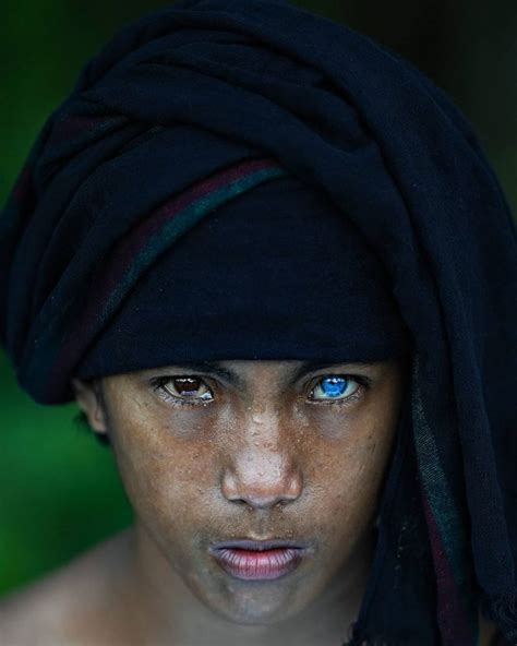 indonesian tribe piercing eyes.